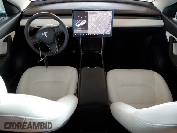 2021 Tesla Model Y Long Range with VIN 5YJYGDEE6MF075819, listed as a Copart auction lot 50903425 with 67,857 mi miles and Salvage Title. Bid and sale history available at DreamBid. Image 8.