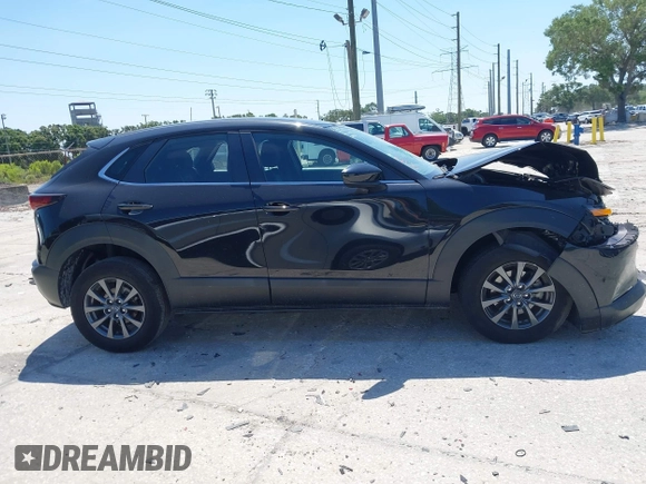 2021 Mazda CX-30 S with VIN 3MVDMAAL7MM268341, listed as a IAAI auction lot 42051154 with 19,539 mi miles and . Bid and sale history available at carsss.com. Image 13.