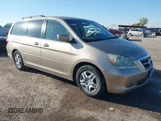 2007 Honda Odyssey EX-L z VIN 5FNRL38607B422225, wystawiony jako IAAI lot #41120393 z przebiegiem 234 968 mil mil oraz . Historia ofert i sprzedaży dostępna na DreamBid. Obrazek 1.
