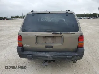1998 Jeep Grand Cherokee Laredo with VIN 1J4GZ58S6WC137968, listed as a Copart auction lot 84083454 with 0 mi miles and Non Repairable. Bid and sale history available at carsss.com. Image 6.