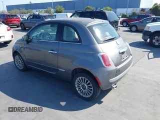 2012 FIAT 500 Lounge z VIN 3C3CFFCRXCT119565, wystawiony jako IAAI lot #42449541 z przebiegiem 93 367 mil mil oraz . Historia ofert i sprzedaży dostępna na DreamBid. Obrazek 3.