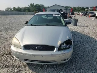 2006 Ford Taurus SE with VIN 1FAFP53U66A149362, listed as a Copart auction lot 64271155 with 166,532 mi miles and Salvage title. Bid and sale history available at DreamBid. Image 13.