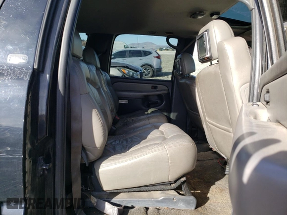 2002 Chevrolet Suburban LT with VIN 1GNFK16T02J261631, listed as a Copart auction lot 46933875 with Not provided miles and Salvage title. Bid and sale history available at DreamBid. Image 11.