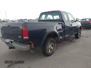 1999 Ford F-150 with VIN 1FTRX18W2XNA90069, listed as a IAAI auction lot 41496543 with 115,787 mi miles and . Bid and sale history available at DreamBid. Image 4.