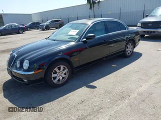 2003 Jaguar S-Type with VIN SAJEA01T13FM70486, listed as a IAAI auction lot 41989501 with 100,109 mi miles and . Bid and sale history available at DreamBid. Image 17.
