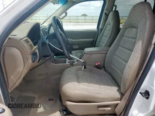 2002 Ford Explorer XLS with VIN 1FMZU62E62UA69368, listed as a Copart auction lot 61571065 with 124,095 mi miles and Salvage title. Bid and sale history available at DreamBid. Image 7.