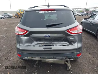 2013 Ford Escape SE with VIN 1FMCU9GX4DUB35629, listed as a IAAI auction lot 42446685 with 103,420 mi miles and . Bid and sale history available at DreamBid. Image 16.