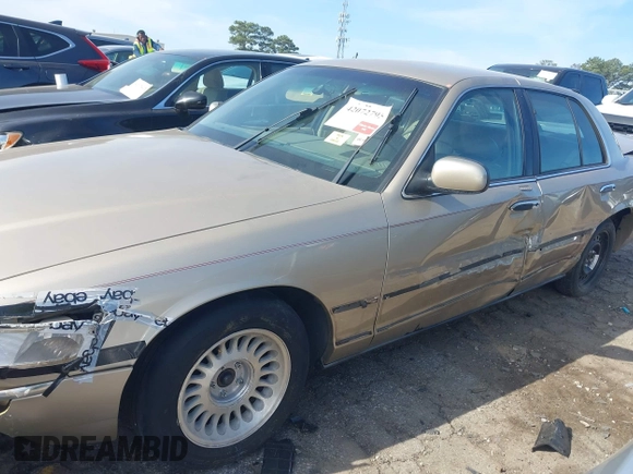 2000 Mercury Grand Marquis LS z VIN 2MEFM75W5YX627647, wystawiony jako IAAI lot #42072795 z przebiegiem 188 113 mil mil oraz . Historia ofert i sprzedaży dostępna na DreamBid. Obrazek 6.