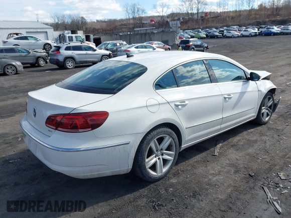 2013 Volkswagen CC Sport with VIN WVWBN7AN9DE516590, listed as a IAAI auction lot 41684586 with 153,312 mi miles. Bid and sale history available at carsss.com. Image 4.