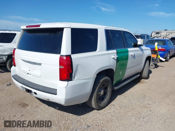 2015 Chevrolet Tahoe Commercial z VIN 1GNLC2EC8FR255526, wystawiony jako IAAI lot #42538320 z przebiegiem 165 502 mil mil oraz . Historia ofert i sprzedaży dostępna na DreamBid. Obrazek 4.