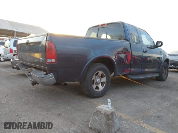 1999 Ford F-150 XL with VIN 1FTRX17L3XKB32547, listed as a IAAI auction lot 41331882 with Not Provided miles. Bid and sale history available at carsss.com. Image 4.