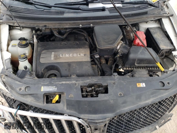 2012 Lincoln MKX with VIN 2LMDJ8JKXCBL19695, listed as a Copart auction lot 43960855 with 94,151 mi miles and Salvage Title. Bid and sale history available at DreamBid. Image 12.