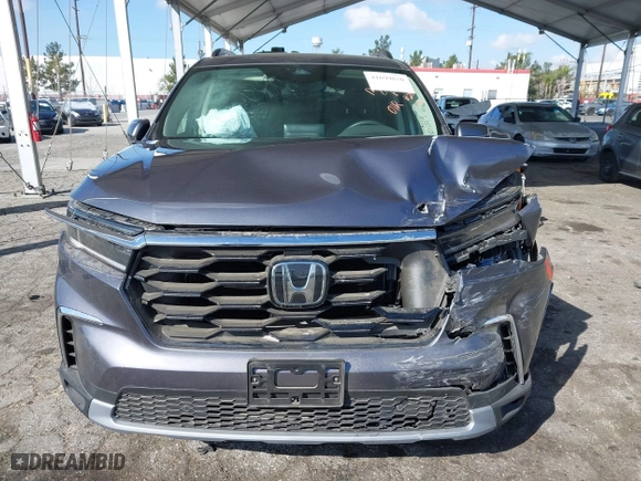 2025 Honda Pilot Touring with VIN 5FNYG2H73SB004351, listed as a IAAI auction lot 41699830 with 6,377 mi miles. Bid and sale history available at carsss.com. Image 12.