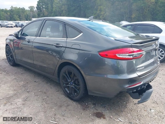 2019 Ford Fusion SE with VIN 3FA6P0HD0KR268309, listed as a IAAI auction lot 40495314 with 130,343 mi miles. Bid and sale history available at carsss.com. Image 3.