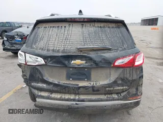 2021 Chevrolet Equinox Premier z VIN 2GNAXXEV2M6118116, wystawiony jako IAAI lot #41185151 z przebiegiem 91 837 mil mil oraz . Historia ofert i sprzedaży dostępna na DreamBid. Obrazek 16.