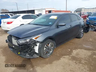 2024 Kia Forte LXS with VIN 3KPF24AD9RE709771, listed as a IAAI auction lot 41351206 with 8,009 mi miles and . Bid and sale history available at DreamBid. Image 2.