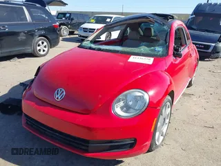 2013 Volkswagen Beetle 2.5L w/Sun/Sound/Nav with VIN 3VWJX7AT0DM673162, listed as a IAAI auction lot 41336320 with Not Provided miles and . Bid and sale history available at DreamBid. Image 17.