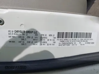 2012 Dodge Grand Caravan SXT with VIN 2C4RDGCGXCR358794, listed as a IAAI auction lot 42007316 with 212,518 mi miles and . Bid and sale history available at DreamBid. Image 9.