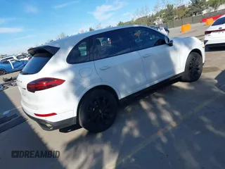 2017 Porsche Cayenne with VIN WP1AA2A26HKA91514, listed as a IAAI auction lot 41484197 with 110,212 mi miles. Bid and sale history available at carsss.com. Image 4.