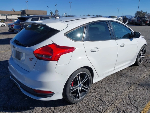 2015 Ford Focus ST with VIN 1FADP3L92FL380352, listed as a IAAI auction lot 41365139 with 136,226 mi miles. Bid and sale history available at carsss.com. Image 4.