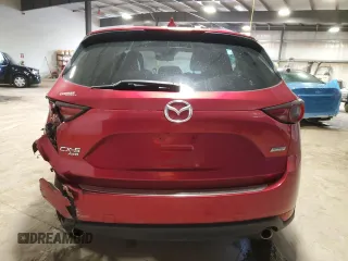 2018 Mazda CX-5 Grand Touring z VIN JM3KFBDMXJ0432197, wystawiony jako Copart lot #50383035 z przebiegiem Nie podano mil oraz Szkoda całkowita • Salvage title. Historia ofert i sprzedaży dostępna na DreamBid. Obrazek 6.