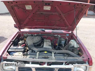 1995 Nissan Frontier with VIN 1N6SD11S5SC465035, listed as a IAAI auction lot 42392941 with 76,482 mi miles and . Bid and sale history available at DreamBid. Image 10.