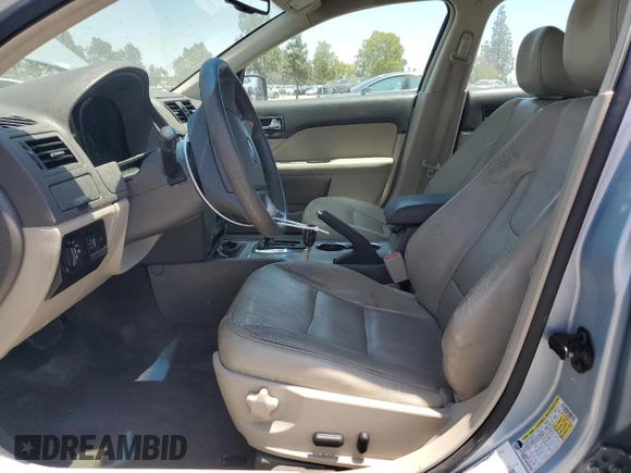2010 Ford Fusion Hybrid z VIN 3FADP0L34AR137176, wystawiony jako Copart lot #62146865 z przebiegiem 135 293 mil mil oraz Szkoda całkowita • Salvage title. Historia ofert i sprzedaży dostępna na DreamBid. Obrazek 7.