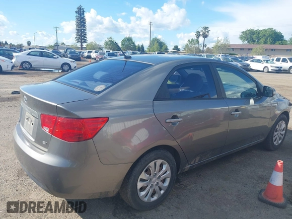2010 Kia Forte EX with VIN KNAFU4A28A5229372, listed as a IAAI auction lot 41911118 with 166,084 mi miles. Bid and sale history available at carsss.com. Image 4.