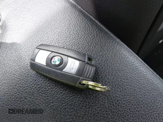 2011 BMW 3 Series 328i xDrive with VIN WBAKF5C55BE586564, listed as a IAAI auction lot 41944192 with 153,167 mi miles. Bid and sale history available at carsss.com. Image 11.