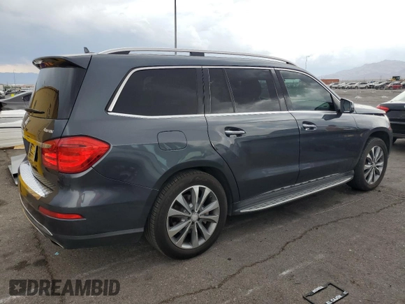 2014 Mercedes-Benz GL 450 z VIN 4JGDF7CE3EA402706, wystawiony jako Copart lot #59056875 z przebiegiem 131 460 mil mil oraz Szkoda całkowita • Salvage title. Historia ofert i sprzedaży dostępna na DreamBid. Obrazek 3.