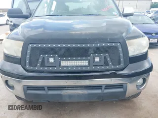 2013 Toyota Tundra Limited with VIN 5TFFY5F19DX142652, listed as a IAAI auction lot 42165369 with 152,286 mi miles and . Bid and sale history available at DreamBid. Image 12.