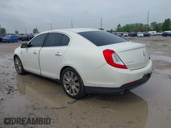 2013 Lincoln MKS EcoBoost with VIN 1LNHL9FT4DG604661, listed as a IAAI auction lot 42211781 with 134,902 mi miles and . Bid and sale history available at DreamBid. Image 3.