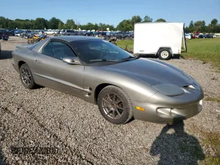 2000 Pontiac Firebird Firebird z VIN 2G2FS22K5Y2116520, wystawiony jako Copart lot #70697134 z przebiegiem 140 412 mil mil oraz Tytuł czysty. Historia ofert i sprzedaży dostępna na DreamBid. Obrazek 4.
