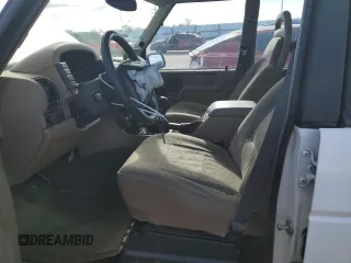 1996 Land Rover Discovery with VIN SALJN1287TA195018, listed as a Copart auction lot 46451505 with 126,913 mi miles and Salvage Title. Bid and sale history available at DreamBid. Image 7.