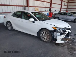 2020 Toyota Camry LE with VIN 4T1C11AK9LU935025, listed as a IAAI auction lot 42054033 with 63,814 mi miles. Bid and sale history available at carsss.com. Image 1.