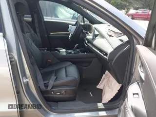 2025 Cadillac XT4 FWD Premium Luxury with VIN 1GYFZCR45SF128039, listed as a IAAI auction lot 42563517 with 18,478 mi miles and . Bid and sale history available at DreamBid. Image 5.
