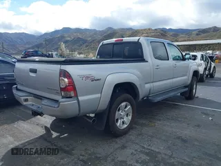 2012 Toyota Tacoma PreRunner with VIN 3TMKU4HN6CM033123, listed as a IAAI auction lot 41478582 with 89,479 mi miles and . Bid and sale history available at DreamBid. Image 4.