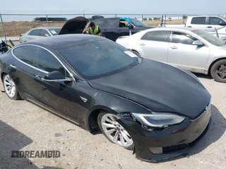 2016 Tesla Model S 90D with VIN 5YJSA1E2XGF167998, listed as a IAAI auction lot 42019913 with 126,258 mi miles and . Bid and sale history available at DreamBid. Image 1.
