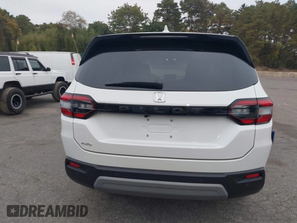 2023 Honda Pilot EX-L with VIN 5FNYG1H58PB016138, listed as a IAAI auction lot 40591717 with 10,068 mi miles and . Bid and sale history available at DreamBid. Image 16.