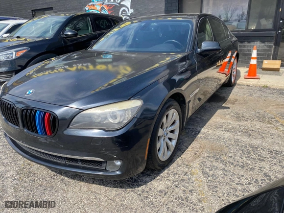 2012 BMW 7 Series 740Li with VIN WBAKB4C55CC576166, listed as a Copart auction lot 52448115 with 154,949 mi miles and Clean Title. Bid and sale history available at carsss.com. Image 2.