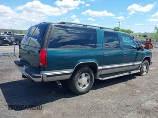 1997 GMC Suburban with VIN 1GKFK16R6VJ706590, listed as a IAAI auction lot 42194855 with 155,680 mi miles and . Bid and sale history available at DreamBid. Image 4.