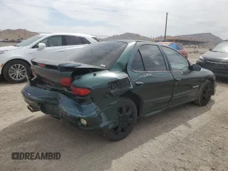 2002 Pontiac Sunfire z VIN 1G2JB52F927241888, wystawiony jako Copart lot #65939404 z przebiegiem 224 388 mil mil oraz Szkody całkowita. Historia ofert i sprzedaży dostępna na DreamBid. Obrazek 3.