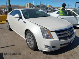 2011 Cadillac CTS Performance with VIN 1G6DJ1EDXB0142703, listed as a IAAI auction lot 42783974 with 144,794 mi miles and . Bid and sale history available at DreamBid. Image 1.