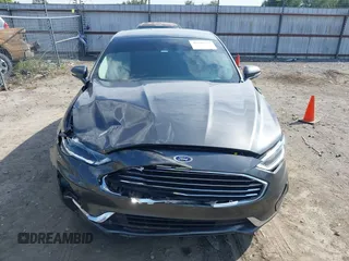 2019 Ford Fusion SEL with VIN 3FA6P0CD7KR159644, listed as a IAAI auction lot 40280287 with 57,329 mi miles. Bid and sale history available at carsss.com. Image 12.