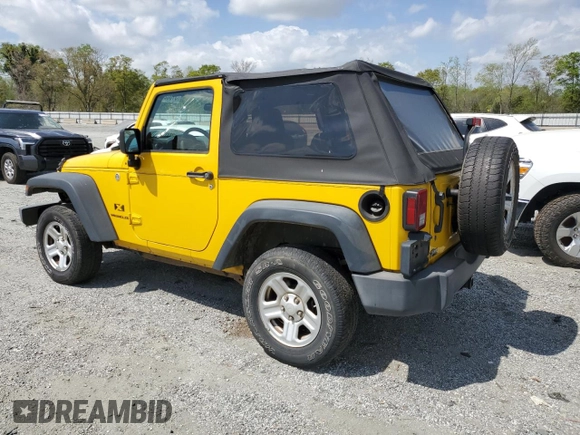 2009 Jeep Wrangler X with VIN 1J4FA241X9L765664, listed as a Copart auction lot 51802065 with 137,053 mi miles and Salvage Title. Bid and sale history available at DreamBid. Image 2.