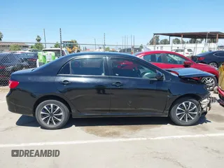 2010 Toyota Corolla with VIN 1NXBU4EE3AZ307385, listed as a IAAI auction lot 42465219 with 201,105 mi miles and . Bid and sale history available at DreamBid. Image 14.