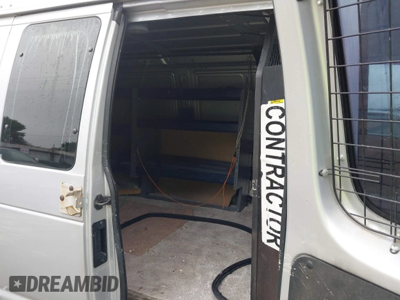 2009 Ford Econoline Cargo Commercial z VIN 1FTNE14W29DA56023, wystawiony jako IAAI lot #42362663 z przebiegiem 211 326 mil mil oraz . Historia ofert i sprzedaży dostępna na DreamBid. Obrazek 8.