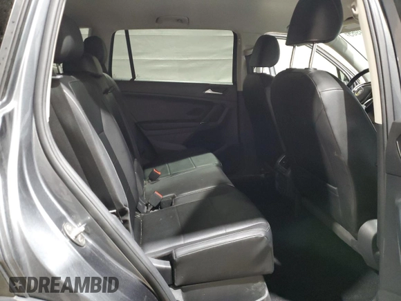 2018 Volkswagen Tiguan SEL z VIN 3VV2B7AX7JM002724, wystawiony jako Copart lot #57390965 z przebiegiem 103 661 mil mil oraz Szkoda całkowita • Salvage title. Historia ofert i sprzedaży dostępna na DreamBid. Obrazek 11.