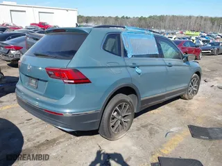 2021 Volkswagen Tiguan SE with VIN 3VV3B7AX1MM023903, listed as a IAAI auction lot 41712233 with 1 mi miles. Bid and sale history available at carsss.com. Image 4.