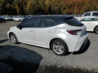 2022 Toyota Corolla Hatchback SE with VIN JTNB4MBE9N3187897, listed as a Copart auction lot 76865574 with 37,321 mi miles and Salvage Title. Bid and sale history available at carsss.com. Image 2.